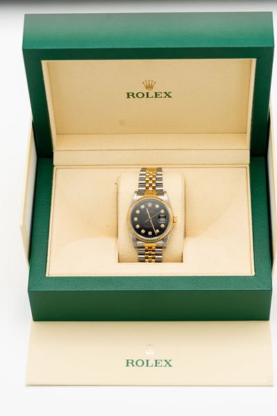 Rolex Datejust – Cadran noir serti et bracelet bicolore